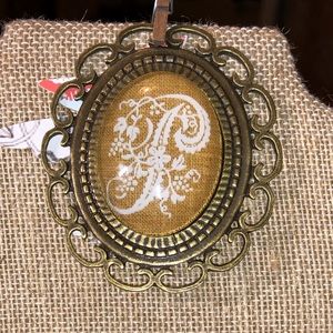 Calligraphy “P” pendant with glass dome